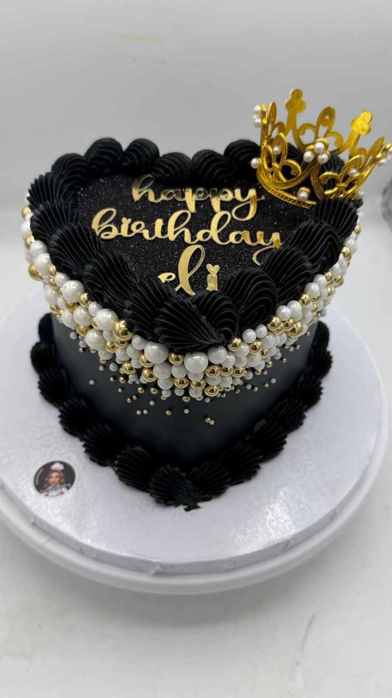 Black and gold celebration cake